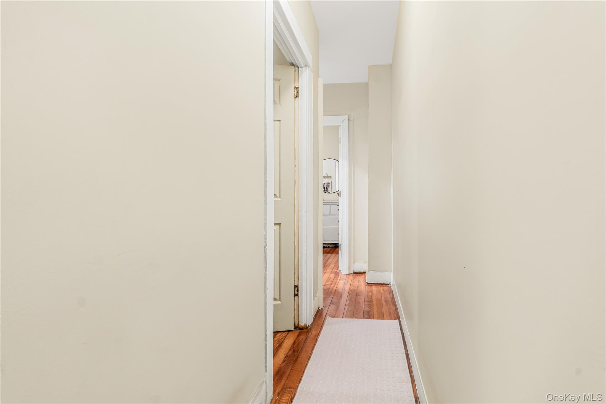 85-14 Sutter Avenue Queens, NY 11417 - Photo 16 of 27 2nd Floor hallway, hard wood floor.