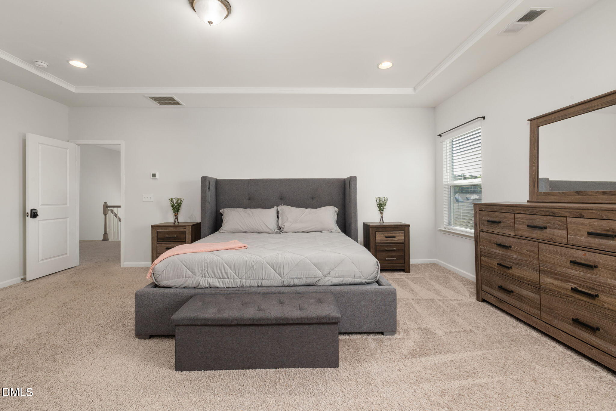 3422 Longleaf Estates Drive Raleigh, NC 27616 - Photo 33 of 71 a bedroom with a bed and furniture