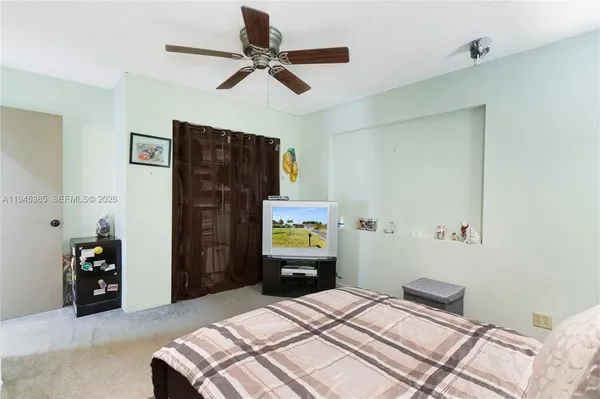 a room with furniture and window