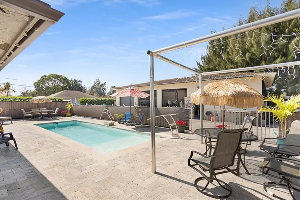 a view of yard with patio