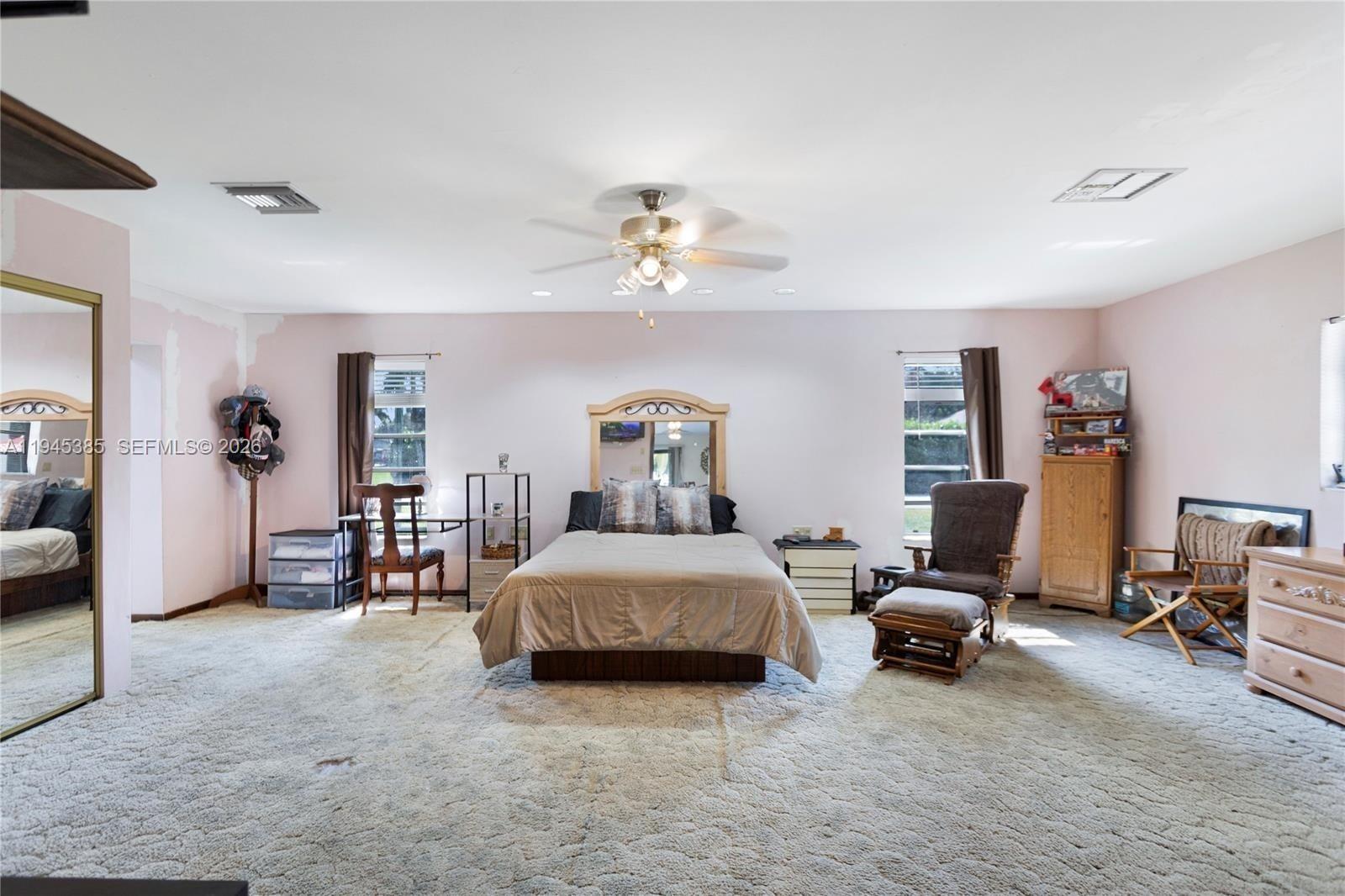 4841 Southwest 201st Terrace Southwest Ranches, FL 33332 - Photo 10 of 16 a living room with furniture gym equipment and a view of bedroom