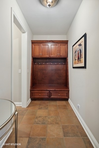 438 West 3rd Street Elmhurst, IL 60126 - Photo 16 of 43 a view of room with window and a ceiling fan