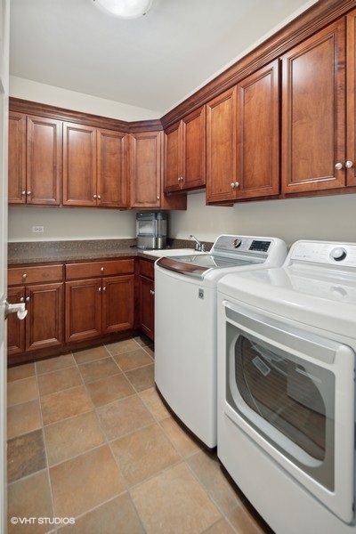 438 West 3rd Street Elmhurst, IL 60126 - Photo 17 of 43 a view of a kitchen with stove top oven and cabinets