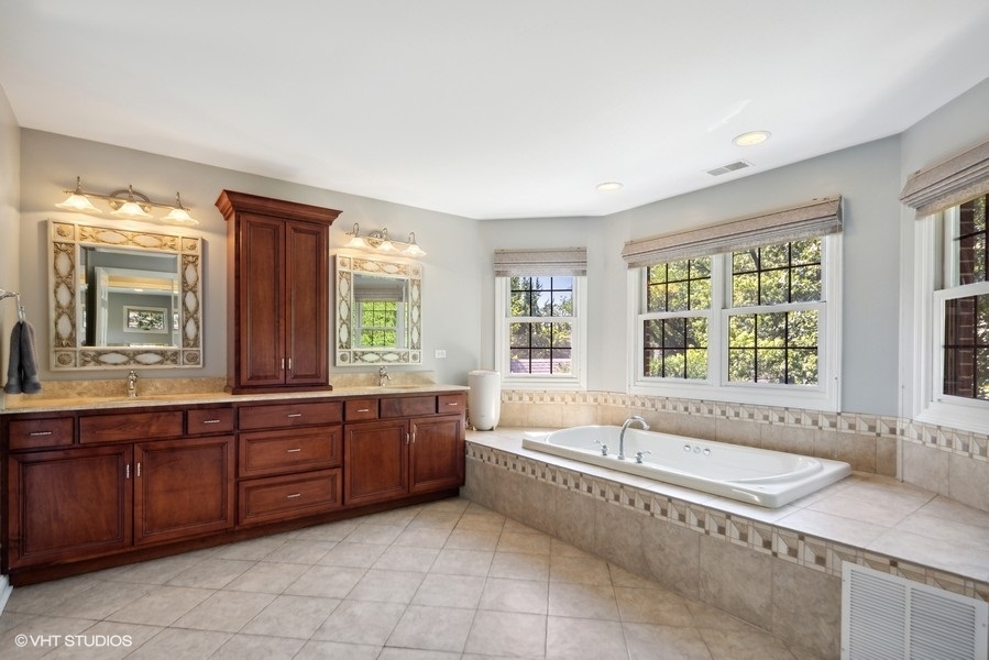 438 West 3rd Street Elmhurst, IL 60126 - Photo 26 of 43 a large spacious bathroom with a large tub and sink