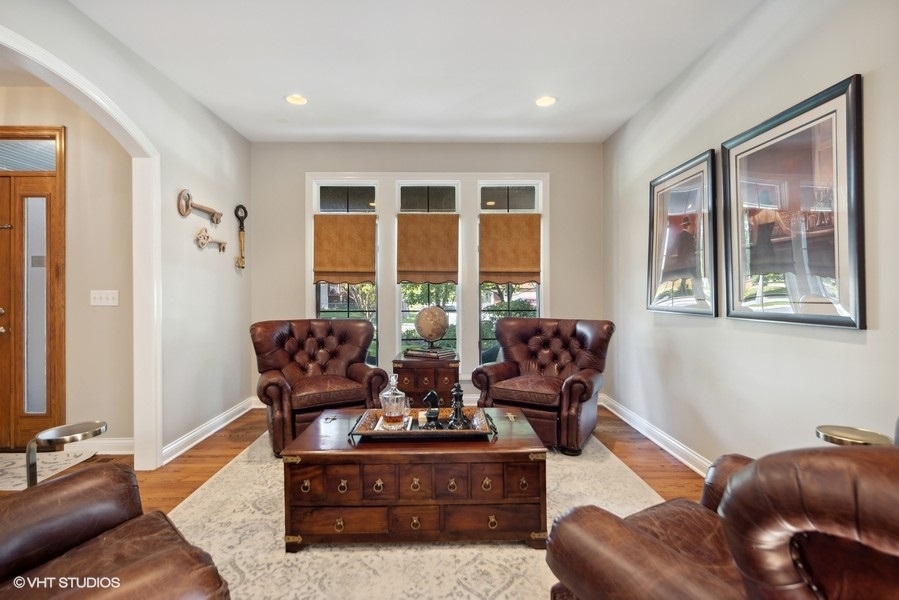 438 West 3rd Street Elmhurst, IL 60126 - Photo 5 of 43 a living room with furniture and a large window