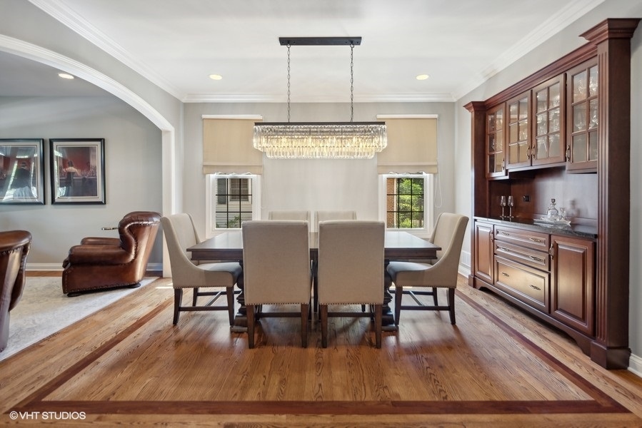 438 West 3rd Street Elmhurst, IL 60126 - Photo 7 of 43 a view of a dining room with furniture window and wooden floor