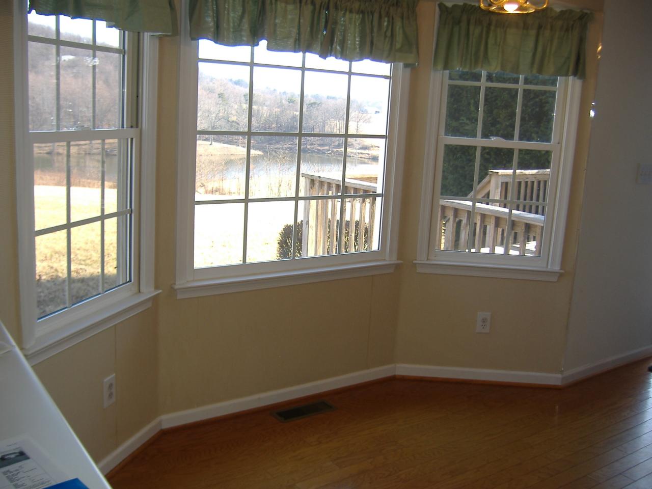 1420 Mill Iron Road Goodview, VA 24095 - Photo 2 of 26 a view of an empty room with a window