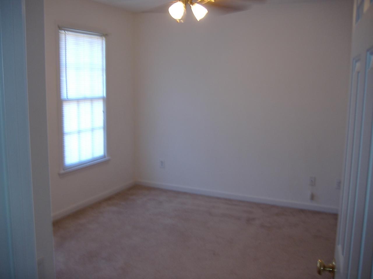 1420 Mill Iron Road Goodview, VA 24095 - Photo 15 of 26 an empty room with a window