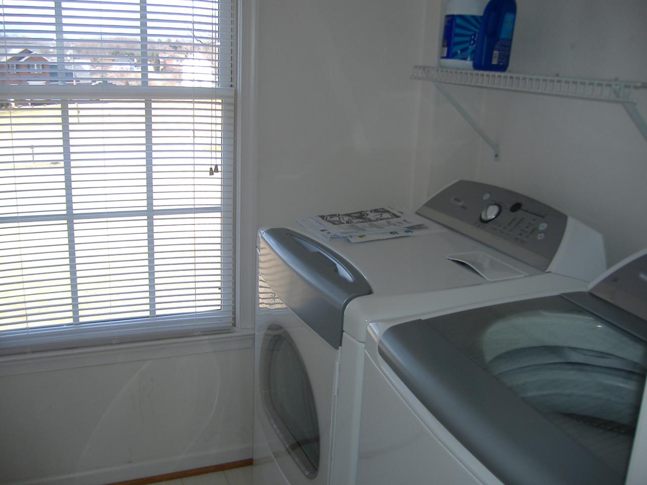 1420 Mill Iron Road Goodview, VA 24095 - Photo 21 of 26 a utility room with dryer and washer