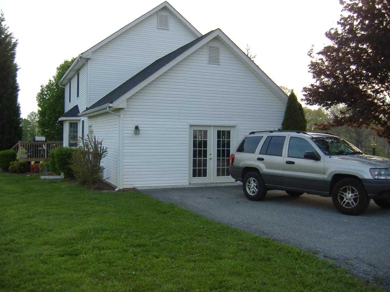 1420 Mill Iron Road Goodview, VA 24095 - Photo 26 of 26 a view of a car parked in front of a house