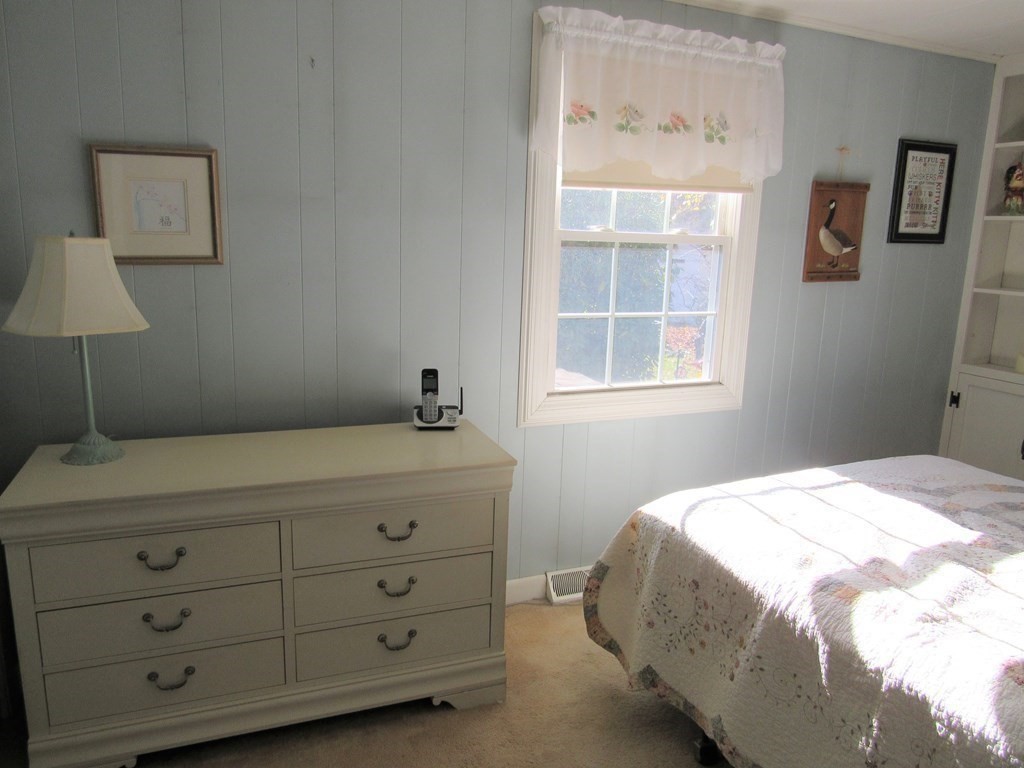 92 Hathaway Street Wareham, MA 02571 - Photo 18 of 29 a bedroom with a bed and a window