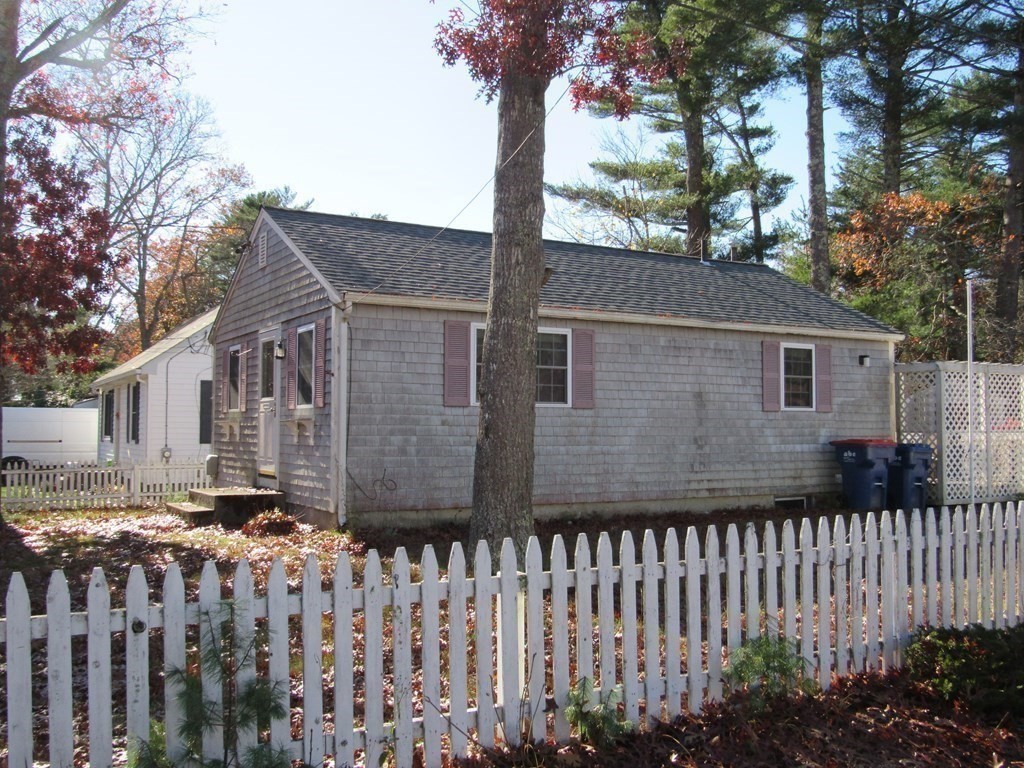 92 Hathaway Street Wareham, MA 02571 - Photo 2 of 29 a front view of a house with a garden