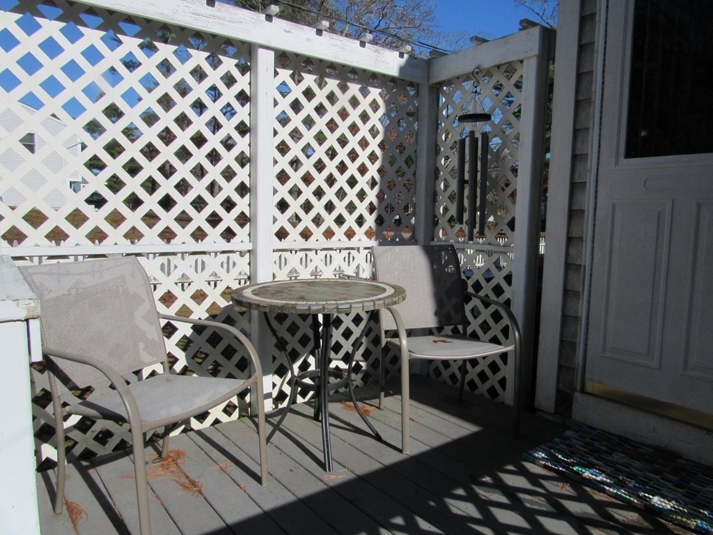 92 Hathaway Street Wareham, MA 02571 - Photo 24 of 29 a view of wooden floor and chairs in a room