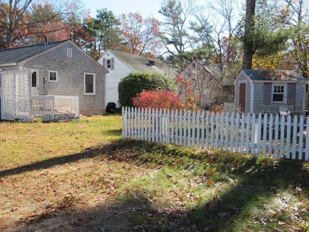 92 Hathaway Street Wareham, MA 02571 - Photo 25 of 29 a view of a house with a yard