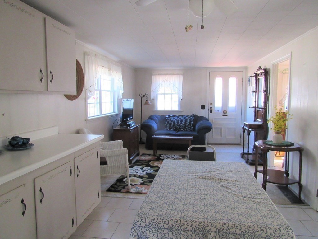 92 Hathaway Street Wareham, MA 02571 - Photo 8 of 29 a living room with furniture and a fireplace