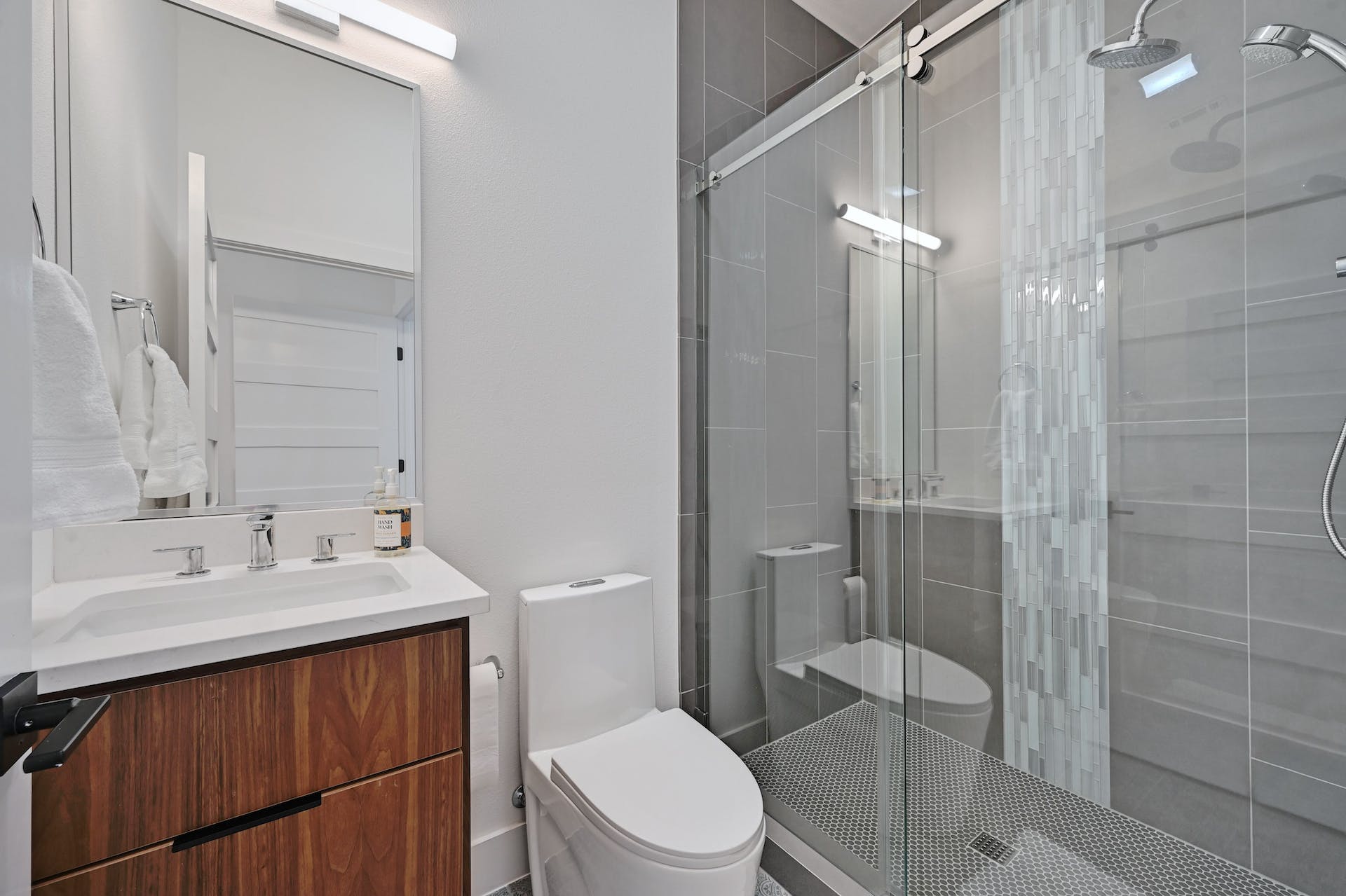 201 Tillery Square, Unit 2 Austin, TX 78702 - Photo 16 of 20 Ensuite bathroom with walk-in shower