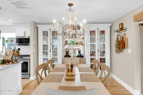 a view of a living room with furniture and a window