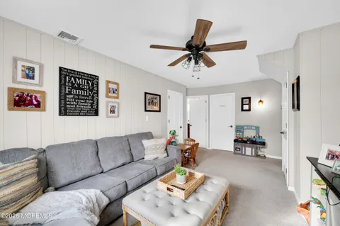 a living room with furniture and a couch
