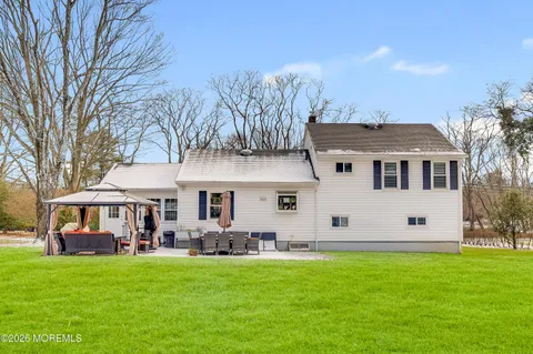 a outdoor space with patio lots of furniture and garden view