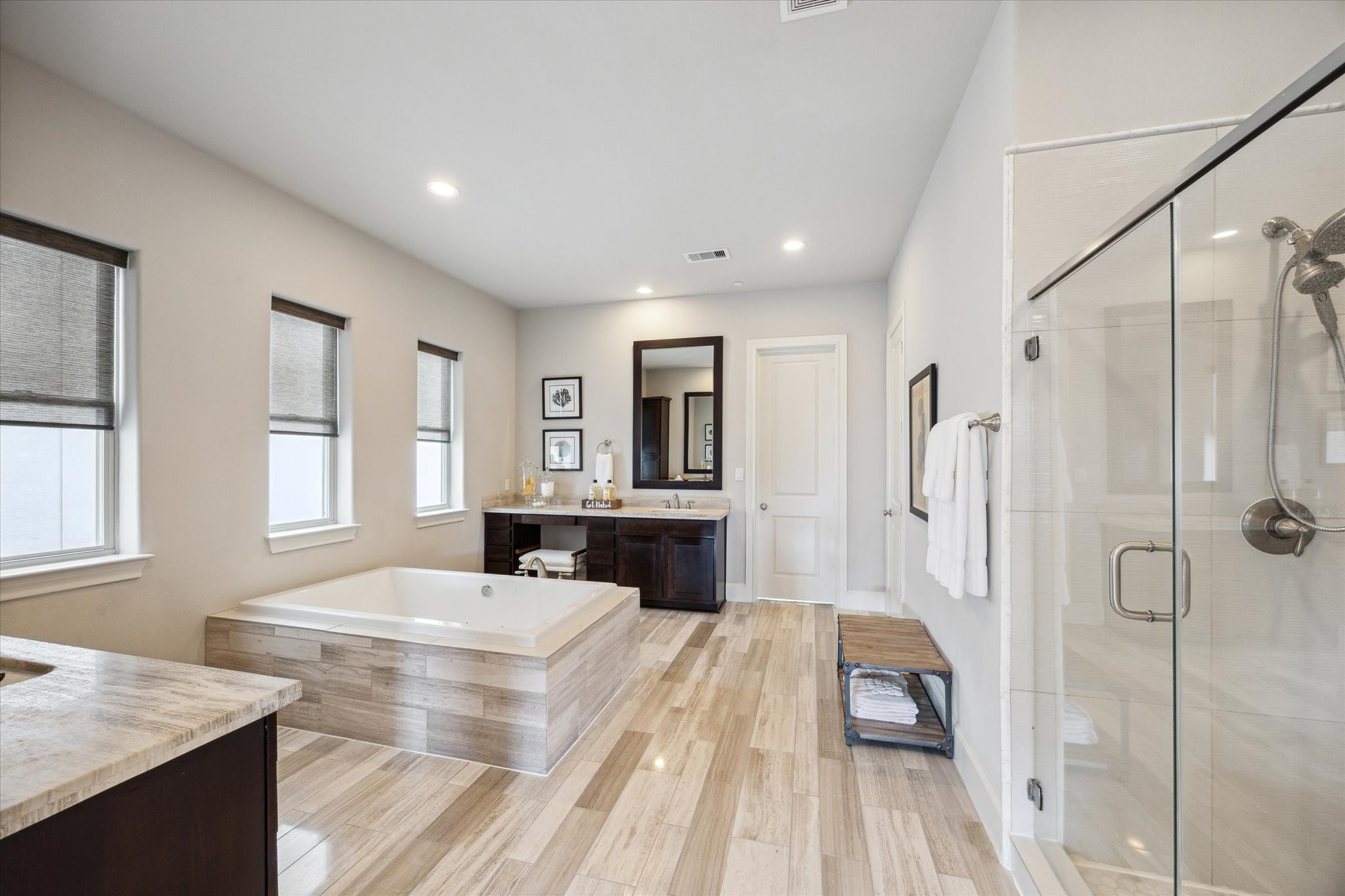 9634 Kings Cross Station Houston, TX 77045 - Photo 14 of 24 a bedroom with a bed and wooden floor
