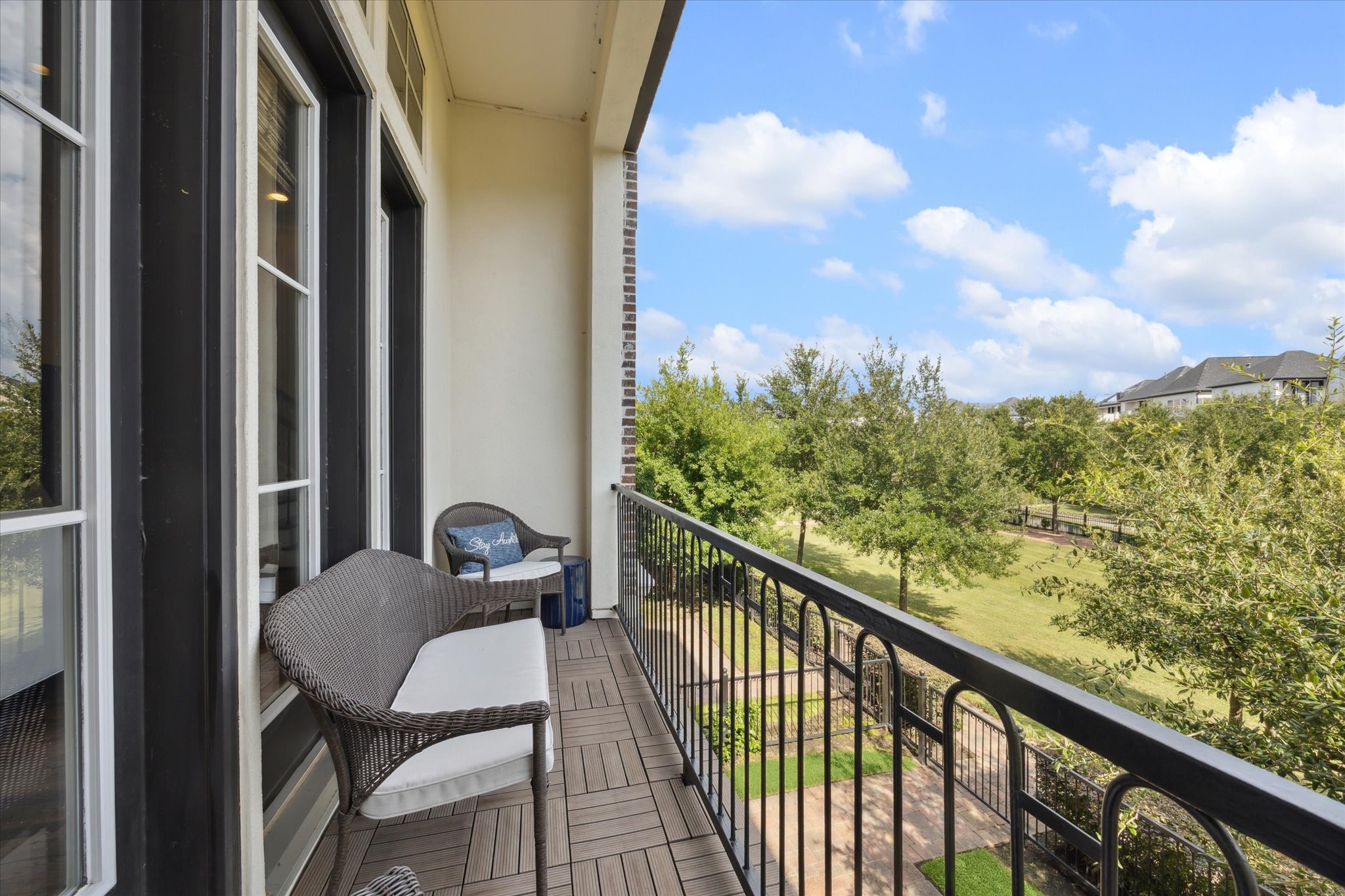 9634 Kings Cross Station Houston, TX 77045 - Photo 19 of 24 a view of a balcony with chairs