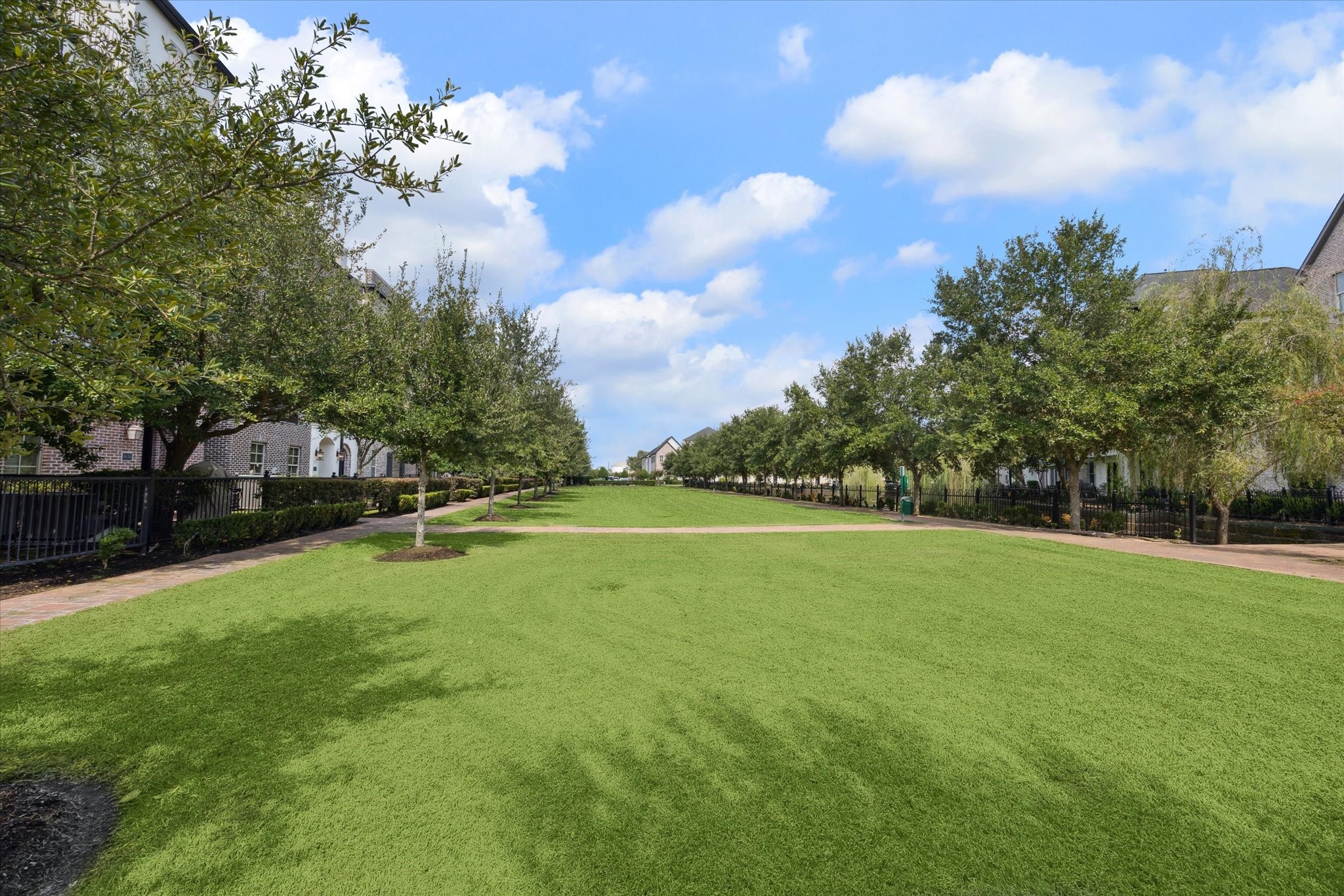 9634 Kings Cross Station Houston, TX 77045 - Photo 20 of 24 a view of a house and a yard with swimming pool
