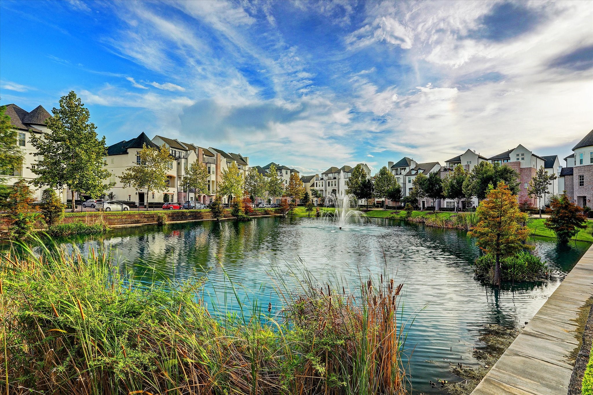 9634 Kings Cross Station Houston, TX 77045 - Photo 21 of 24 a view of a lake with houses
