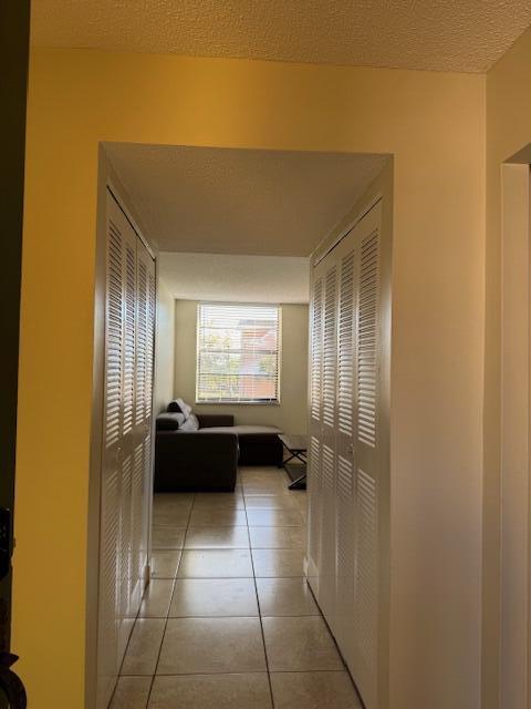 3100 North Pine Island Road, Unit 301 Sunrise, FL 33351 - Photo 7 of 9 lc living room view from entrance