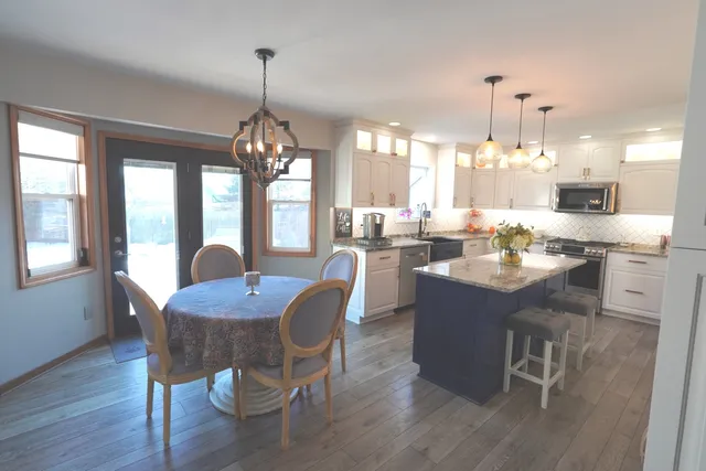a view of dining room and wooden floor