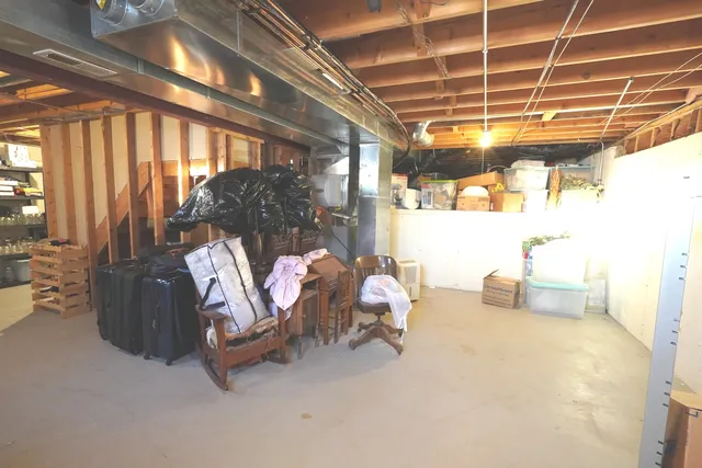 a room with furniture and a chandelier