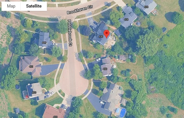 a house view with a garden space