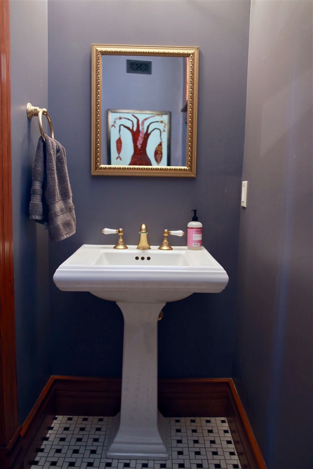 15 Bridge Street St. Augustine, FL 32084 - Photo 33 of 49 a bathroom with a sink and mirror