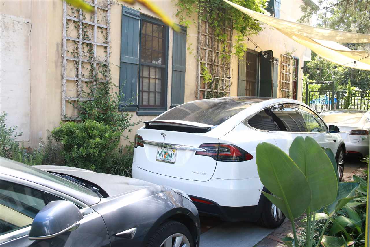 15 Bridge Street St. Augustine, FL 32084 - Photo 40 of 49 a view of a balcony with a couch and iron fence