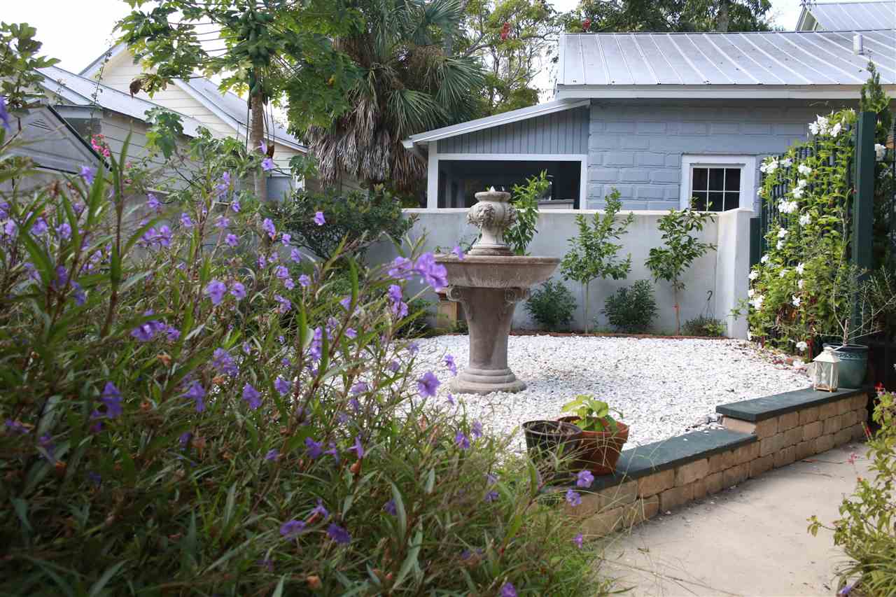 15 Bridge Street St. Augustine, FL 32084 - Photo 41 of 49 a front view of a house with yard