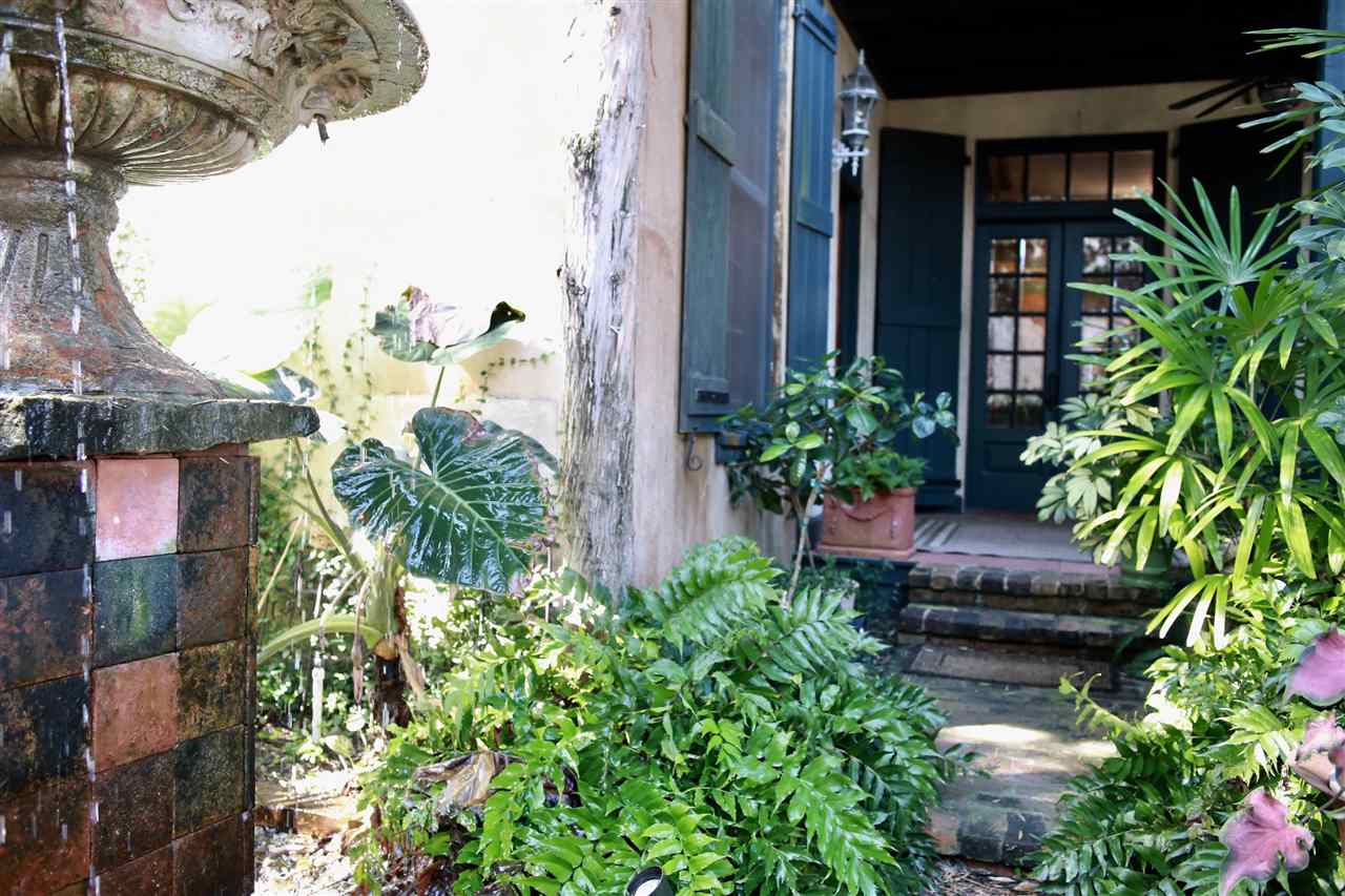 15 Bridge Street St. Augustine, FL 32084 - Photo 42 of 49 a view of a garden with a fountain