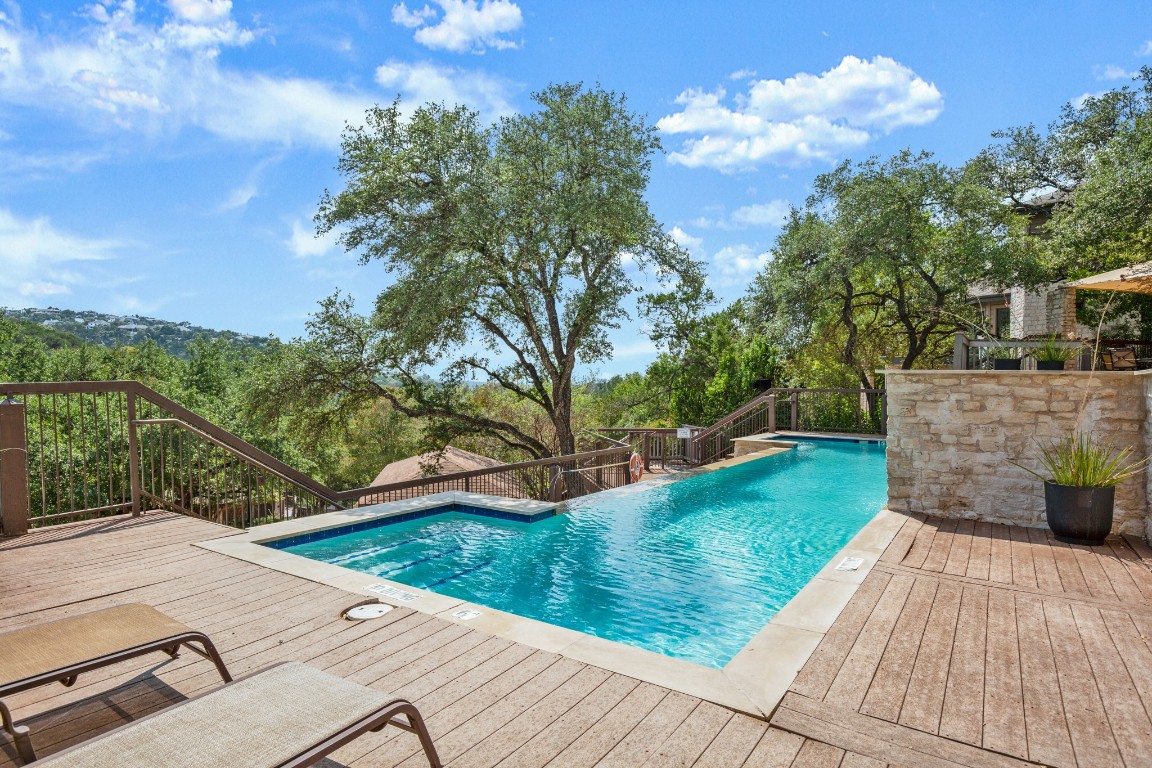 4906 Bob Cat Run Austin, TX 78731 - Photo 30 of 37 Outdoor pool with a wooden deck