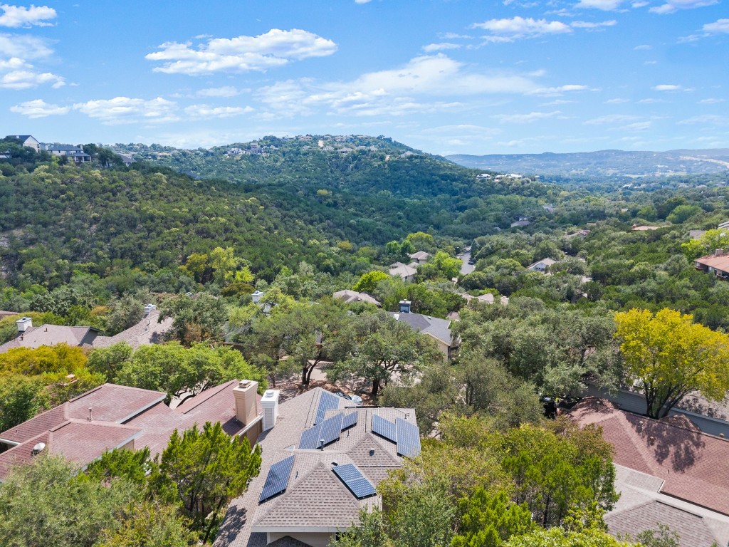 4906 Bob Cat Run Austin, TX 78731 - Photo 34 of 37 Bird's eye view of a mountainous background and a forest