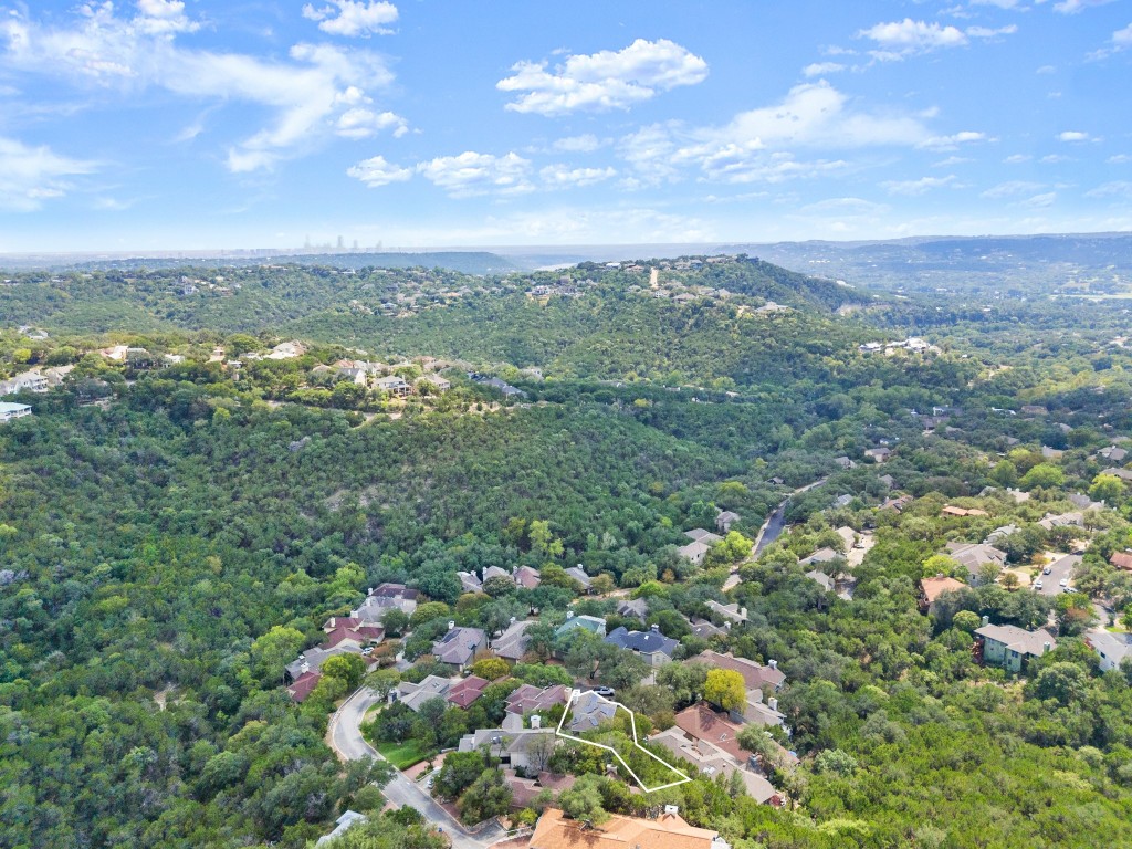 4906 Bob Cat Run Austin, TX 78731 - Photo 35 of 37 Aerial view of property's location featuring property parcel outlined and a forest
