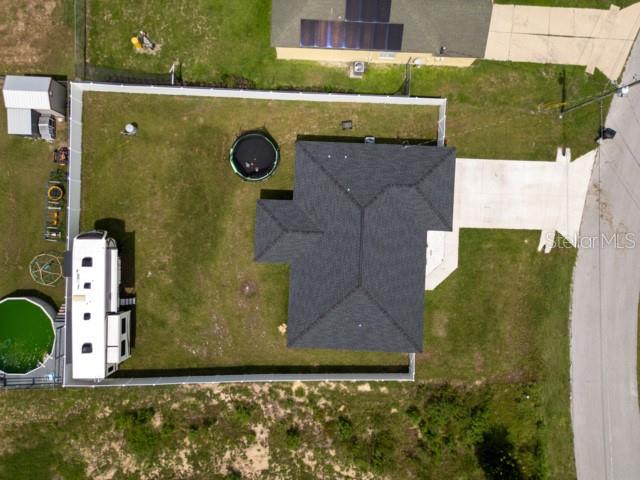 156 Juniper Circle Ocala, FL 34480 - Photo 26 of 40 an aerial view of a house with a yard