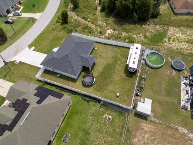 156 Juniper Circle Ocala, FL 34480 - Photo 28 of 40 an aerial view of a house having yard
