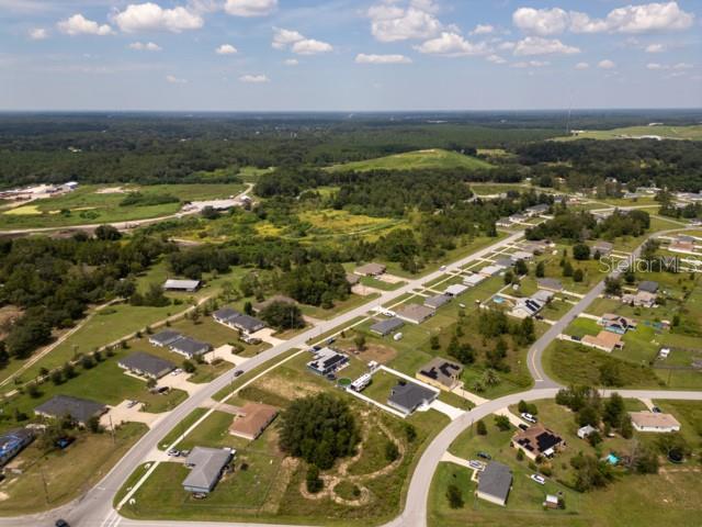 156 Juniper Circle Ocala, FL 34480 - Photo 32 of 40 an aerial view of residential houses with outdoor space
