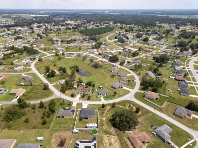 156 Juniper Circle Ocala, FL 34480 - Photo 33 of 40 an aerial view of residential houses with outdoor space