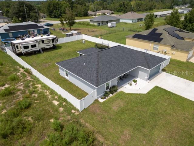 156 Juniper Circle Ocala, FL 34480 - Photo 34 of 40 a view of a house with yard and lake view
