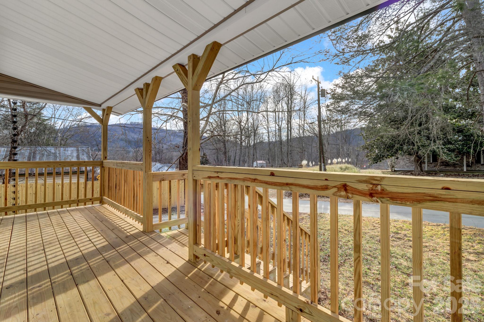 246 Marion Street Marion, NC 28752 - Photo 12 of 48 a view of swimming pool with outdoor seating