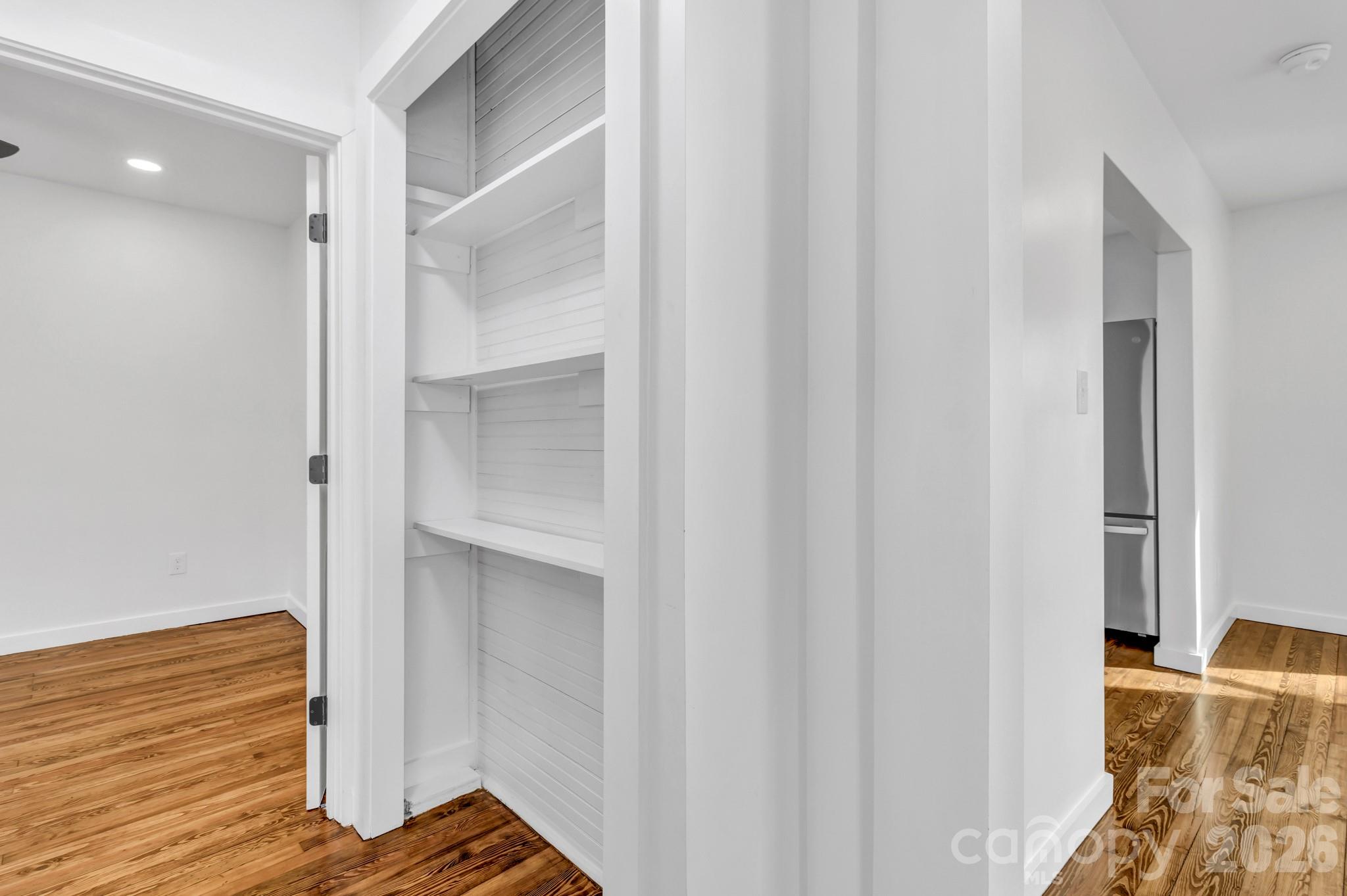 246 Marion Street Marion, NC 28752 - Photo 28 of 48 a area with wooden floor and closet