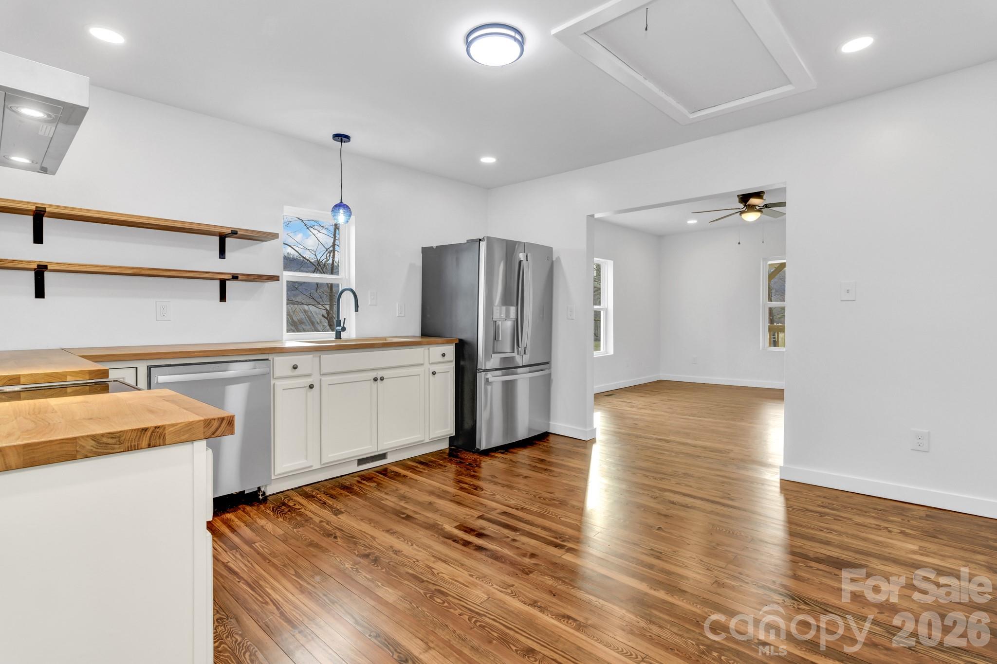 246 Marion Street Marion, NC 28752 - Photo 34 of 48 a kitchen with a sink appliances and cabinets