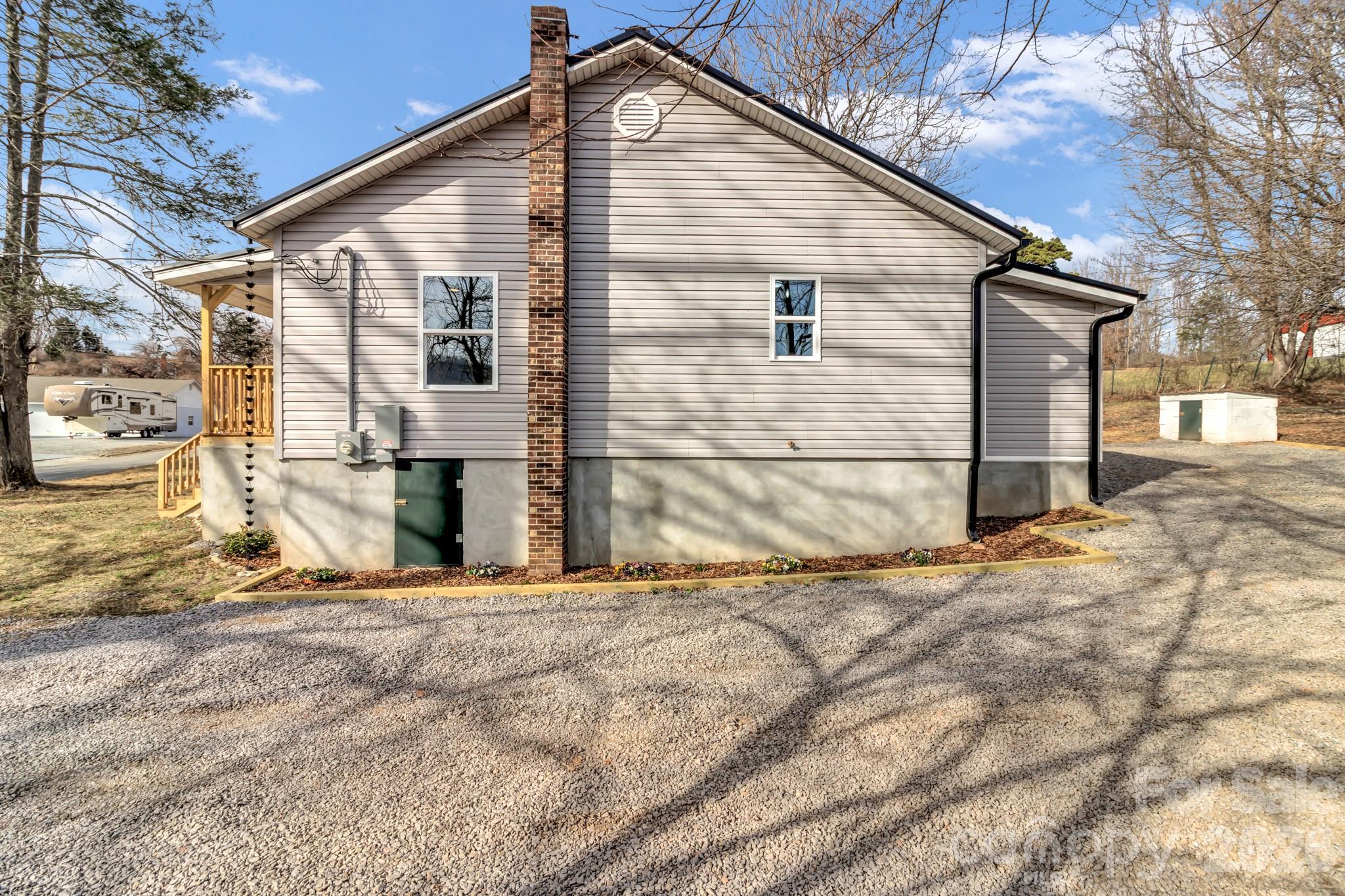 246 Marion Street Marion, NC 28752 - Photo 45 of 48 a view of a house with a yard