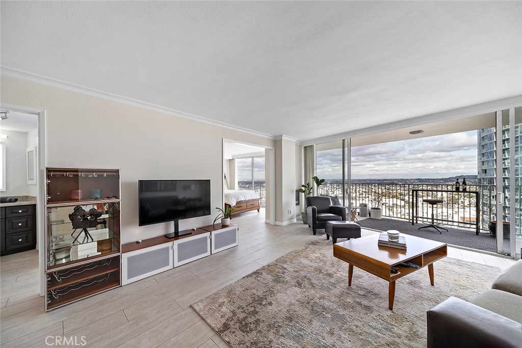 700 East Ocean Boulevard, Unit 3003 Long Beach, CA 90802 - Photo 11 of 39 a living room with furniture tv and a window