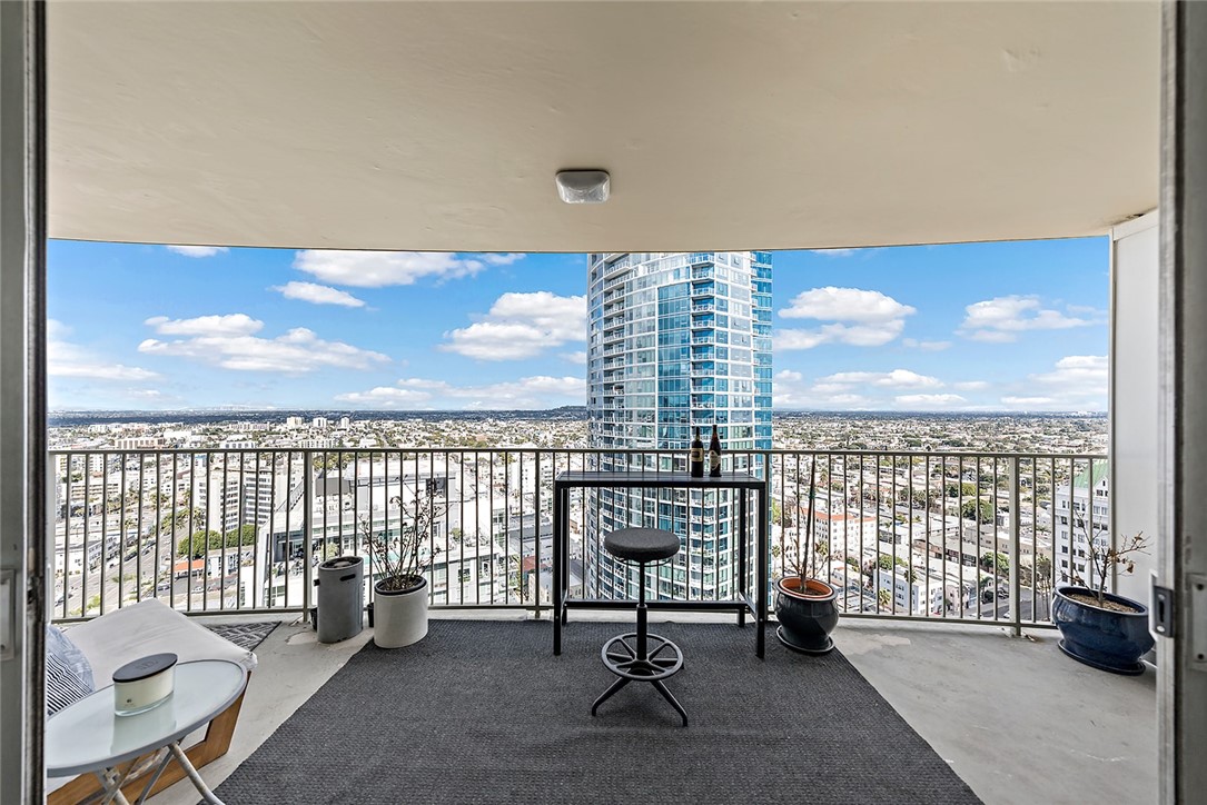 700 East Ocean Boulevard, Unit 3003 Long Beach, CA 90802 - Photo 13 of 39 a living room with furniture and a floor to ceiling window