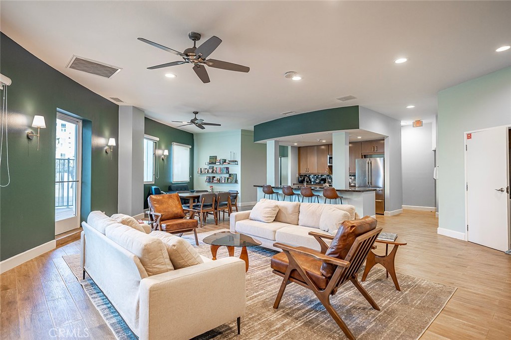 700 East Ocean Boulevard, Unit 3003 Long Beach, CA 90802 - Photo 29 of 39 a living room with furniture and a ceiling fan